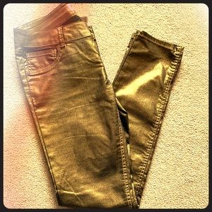 Gold colored stretch jeans